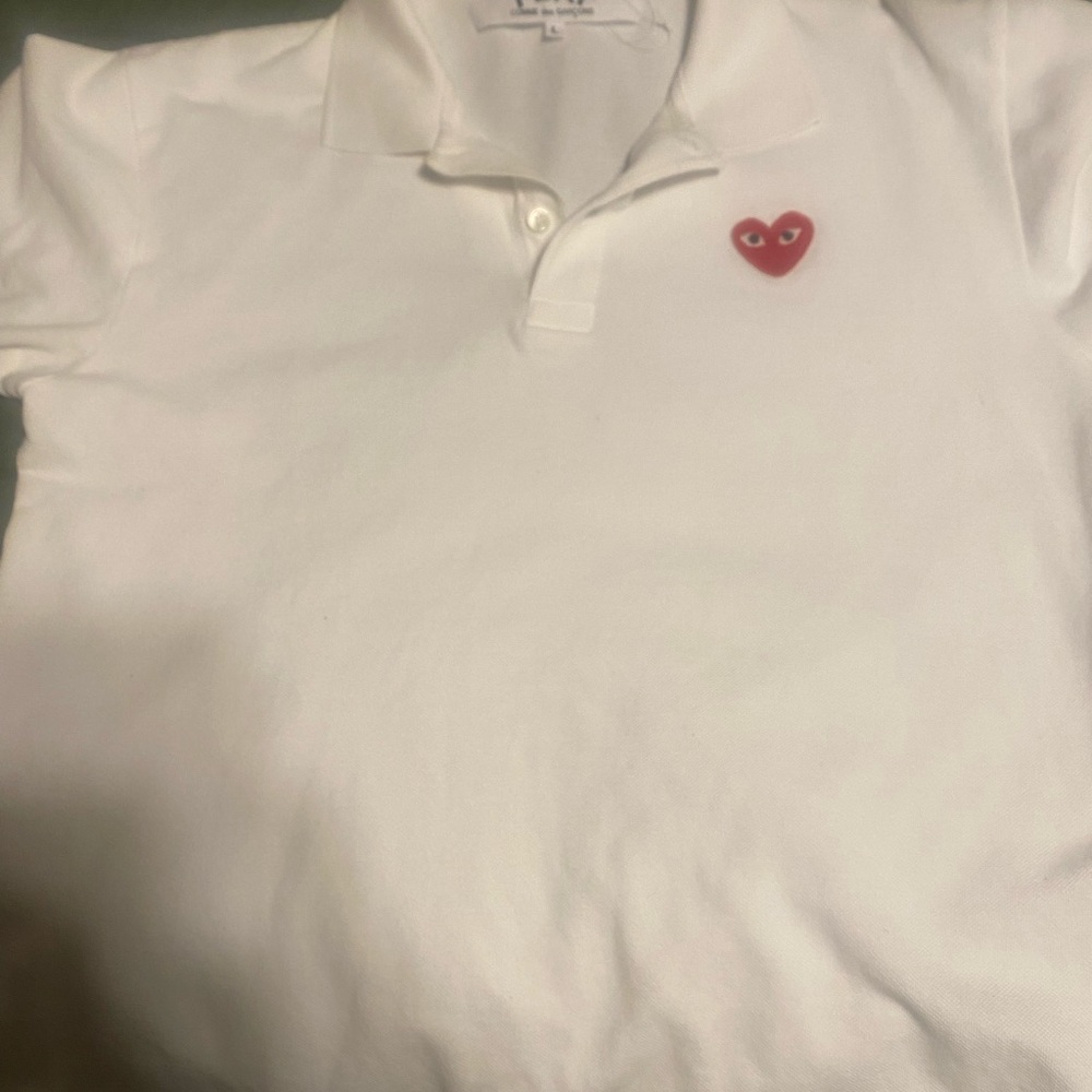Selling gently used polo shirt